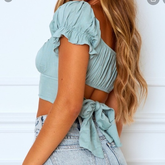 Light blue wrap top. - Picture 5 of 5